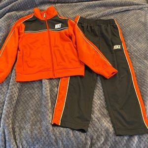 EC boys Nike track sweat suit in grey and orange sz5